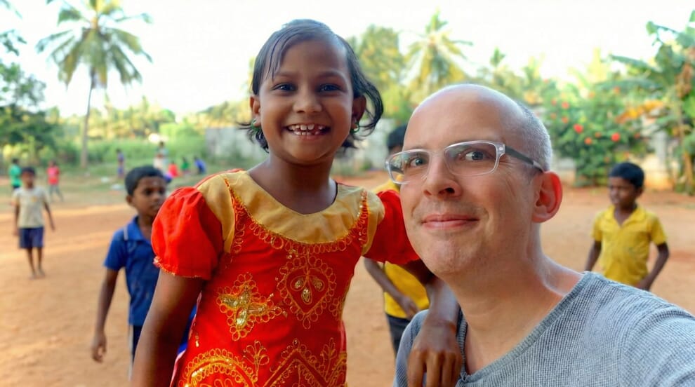 Myself at the school in India posing with one of the children 